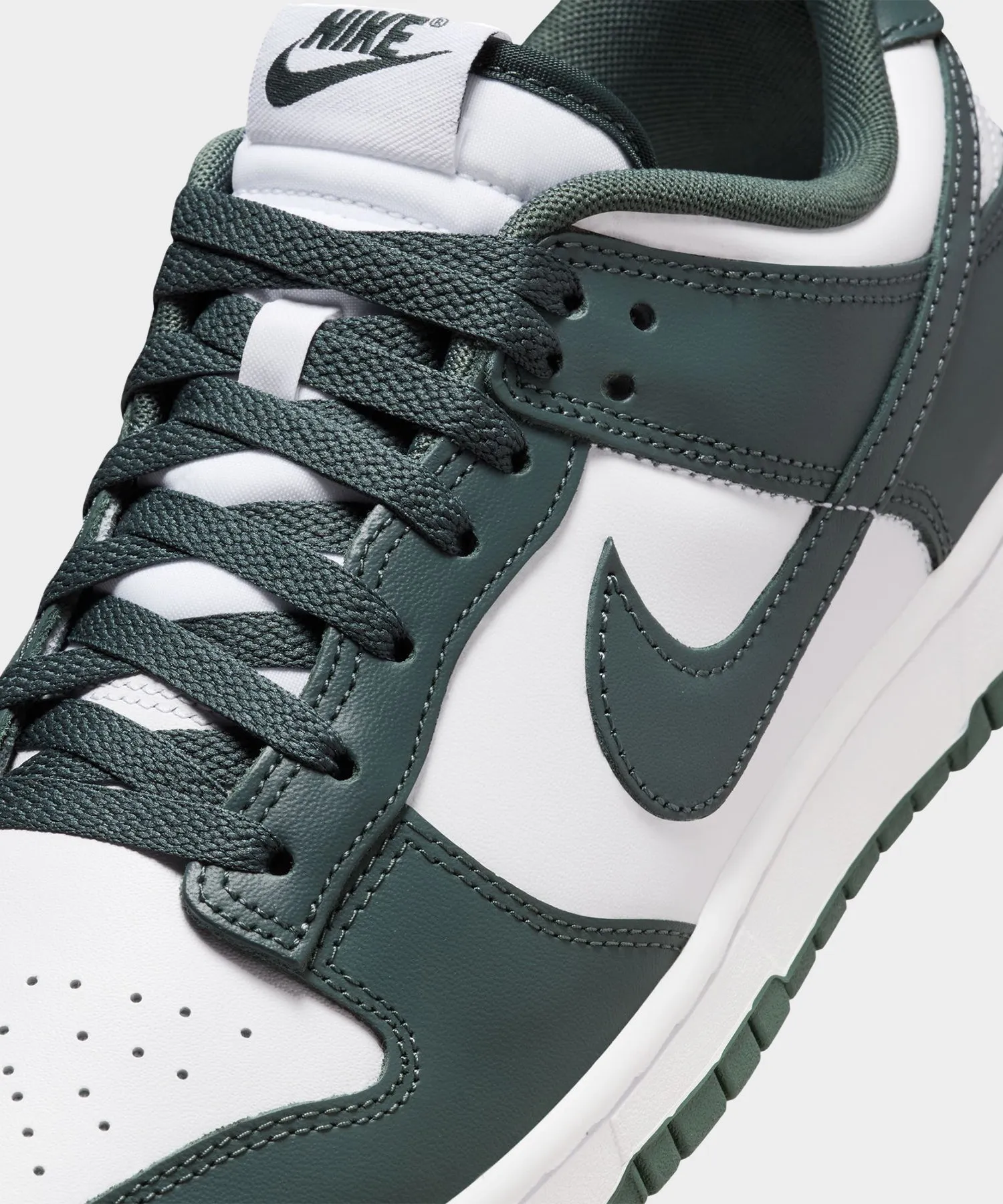 Nike Dunk Low in White / Vintage Green